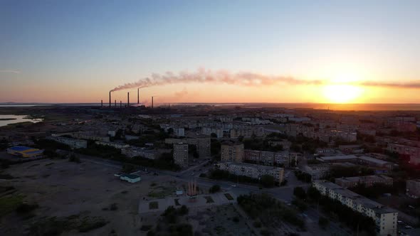 An Epic Sunset with a View of the Smoking Factory