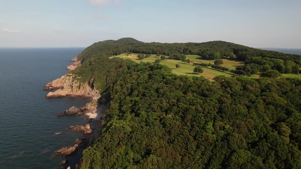 Aerial view of cliff coast with golf course, Kullaberg, Sweden