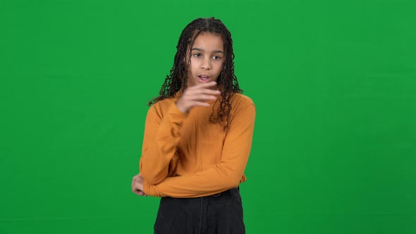 Irritated Bored Teenage Girl Rolling Eyes Gesturing Saying Blabla on Green Screen