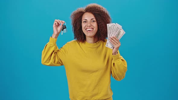 African American Lady Shows Money Cash and Key to New Auto