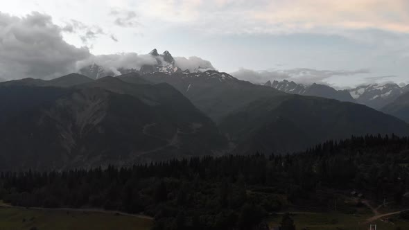 Aerial View of the Mountains Range with Clouds and Storm Clouds