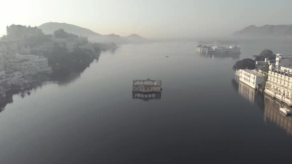 Mystical mood of Lake Pichola and islands palaces, Udaipur, India. Scenic aerial