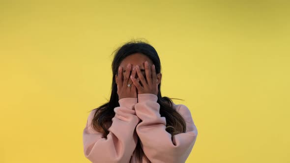 Multiracial Young Woman Getting Good News From Somebody and Showing Her Astonishment