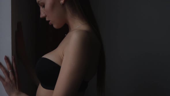 Woman in Black Lingerie Showing Body Shapes