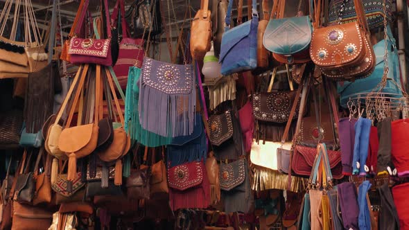 Marrakech - Market Stalls in Medina Old City. Bags and Leatherin Marocco Marketplace, Craftsman