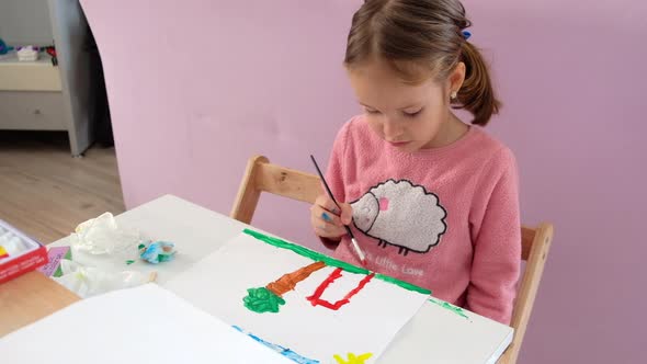 Child Painting a Picture
