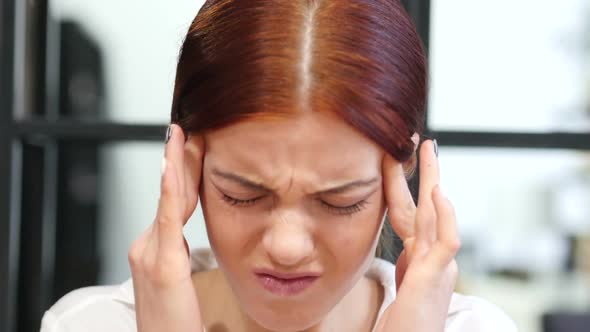 Close Up of Tense Woman with Headache, Frustration