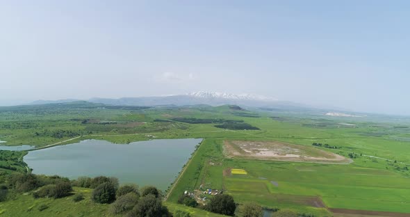 Aerial view of a small lake in Golan Heights, Israel.