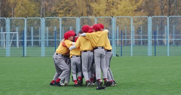 Baseball School Team Boys Baseball Players Yellow Uniforms Get Hugs Rejoices Victory Successful Game