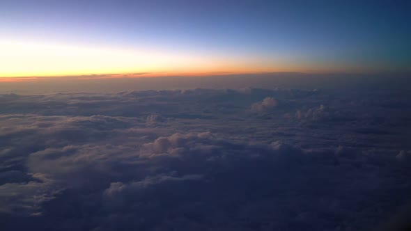 Sunset from airplane passenger window lookout.