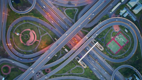 4K : Time lapse Aerial view and top view of traffic on city. Expressway with car lots