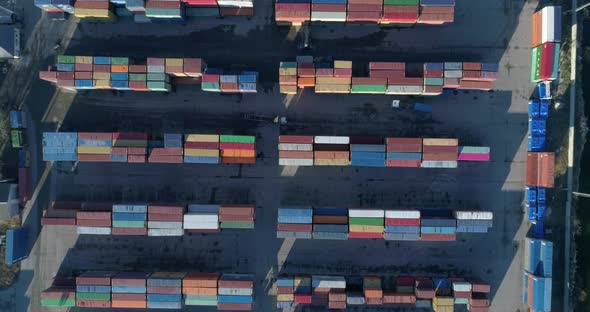 Top down view of port container terminal. Industrial cargo harbor