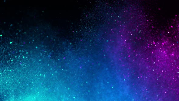Super Slow Motion Shot of Neon Glitter Background at 1000Fps alt