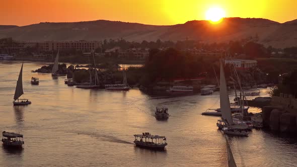 Felucca Boats on Nile River in Aswan at Sunset