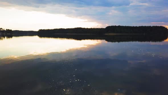 Aerial Shot of  Sunset Over Lake. Kashubia, Lake Wdzydze, Poland.