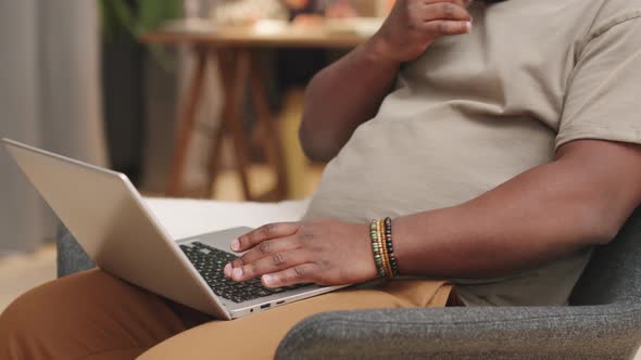 Male Hands Typing On Laptop