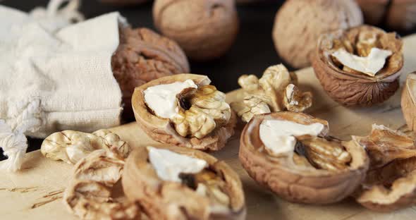 Delicious and Fresh Walnuts on a Wooden Table