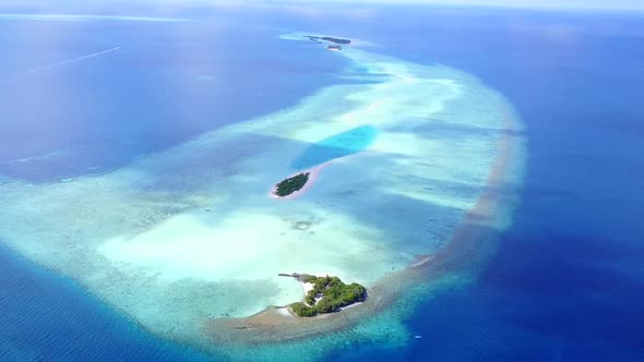 Drone view landscape of tourist beach trip by clear water with sand background