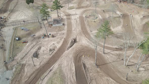 aerial drone shot of dirtbike track (flyover) shit in 4k 24p