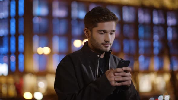 Calm Man Texting Mobile Phone on Dark Street, Relaxed Guy Typing Smartphone