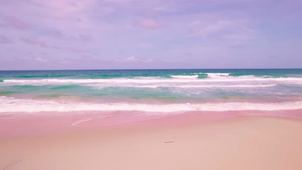 Top view tropical beach Amazing waves sea background. Crashing waves on beach sand, Beautiful sea