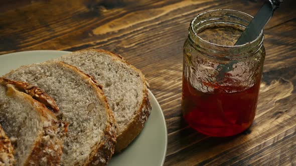 Slices Of Bread And Fruit Jam On Table