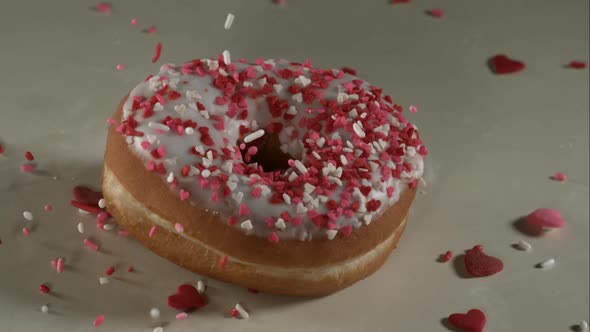 Doughnuts falling and bouncing in ultra slow mo 1500fps - reflective surface - DOUGHNUTS PHANTOM 