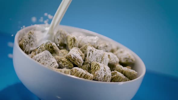 Pouring Milk Into Wheat Cereal