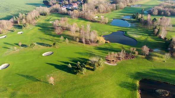 Aerial View of a Golf Course During Autumn Season