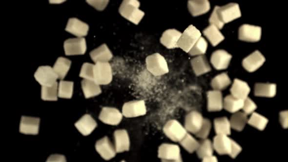 Super Slow Motion Sugar Cubes Rise Up and Fall Down