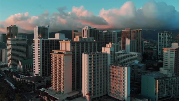 Aerial drone footage of Honolulu, Hawaii. Beautiful real estate, buildings in the city. Palm trees