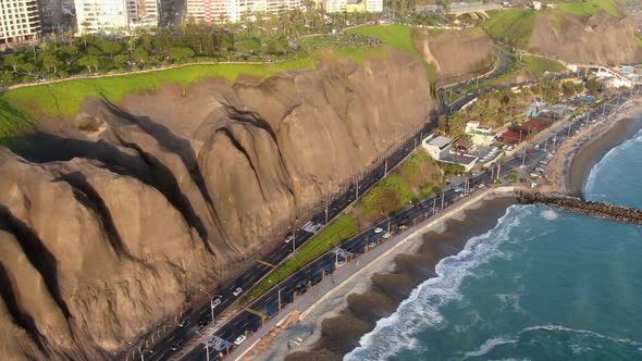 Coastal Road By The Beach. La Pampilla Beach In Miraflores District, Huamalies, Peru With View Of Pa