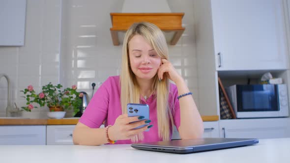 Domestic violence survivor woman with prosthetic eye and facial scars using phone with smile