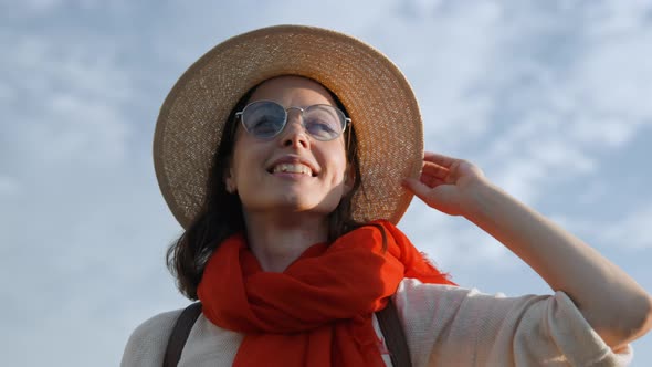 Portrait of happy woman in european city in summer