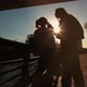 Mother and Daughter Silhouettes Under the Bridge - VideoHive Item for Sale