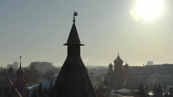 The Wooden Tower of an Ancient Castle Against the Background of the Domes of the Tula Temple and