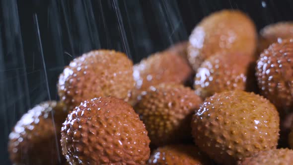 Splashes of Water Fall on Lychee