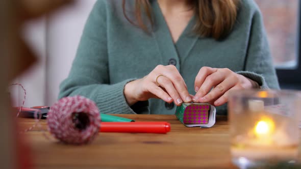 Hands Making Advent Calendar on Christmas at Home