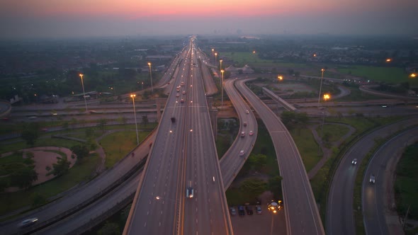 4K : Aerial time lapse in motion drone shot of freeway and interstate traffic