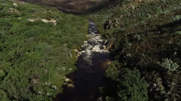 Aerial footage over the freestone streams in the Du Toitskloof mountains in the Western Cape of Sout