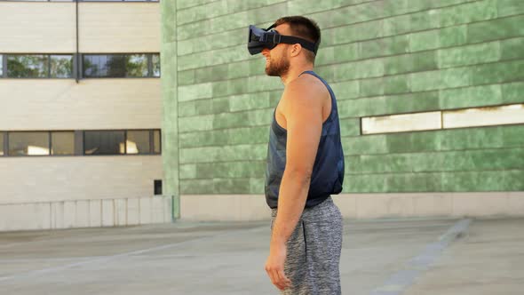 Happy Young Man with Vr Glasses Outdoors