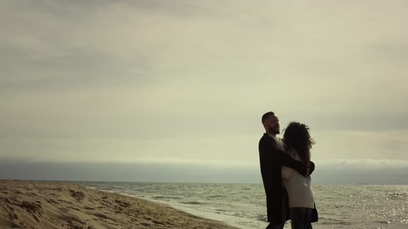 Beautiful Couple Embracing Beach at Nature