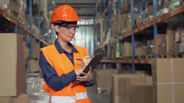 Female at Work in Warehouse