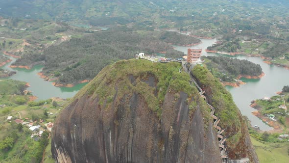 Aerial View Of Piedra del peñol monolith big black stone in Guatape, Antioquia - Colombia tourist si