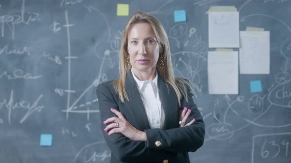 Portrait Shot of Confident Businesswoman Standing in Boardroom