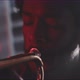 Close up of a trumpeter playing in backlit and red neon lights - VideoHive Item for Sale