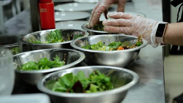 Cooking Vegetable Salad in a Restaurant Kitchen