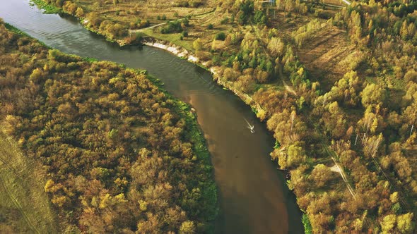Aerial View Of Old Boat Floating In River Autumn Landscape