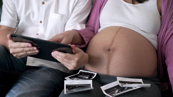 Pregnant Couple Feels Love and Relax at Home