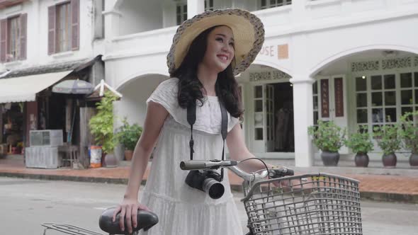 Beautiful Asian Girl Travel With Bicycle